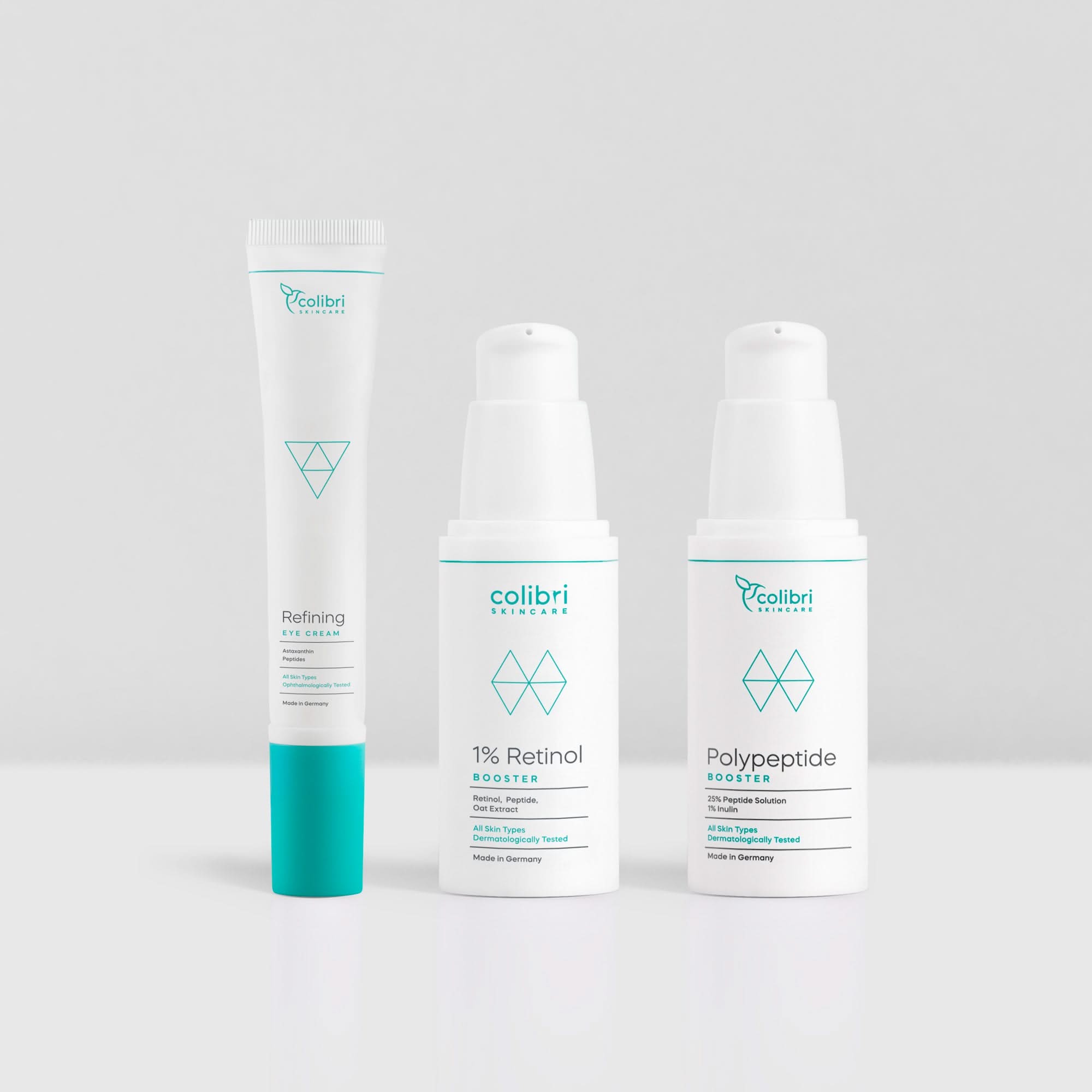 Drei Hautpflegeprodukte von Colibri Skincare auf weißem Hintergrund: Augencreme, Retinol-Booster, Polypeptid-Booster.